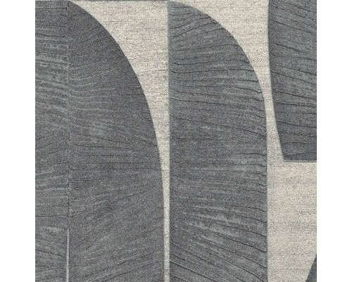 Detailní pohled na koberec s geometrickými vzory