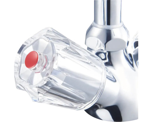 Vodovodní kohoutek s průhlednou rukojetí a červeným knoflíkem