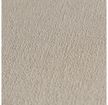 Detail béžové tapety s hrubou strukturou