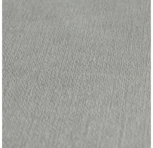 Detail světlé strukturované tapety