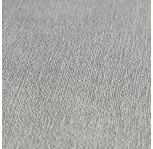 Detail bílé strukturované tapety