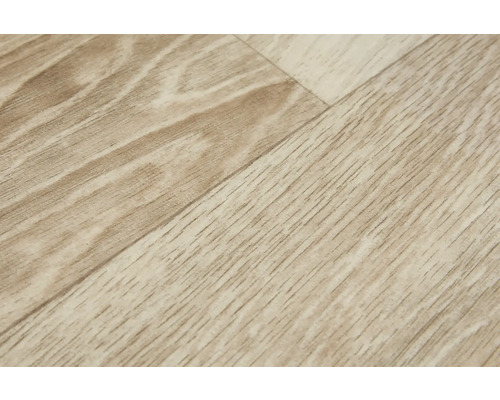 Detail laminátové podlahy s dřevěným vzhledem