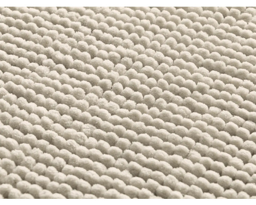 Detailní pohled na koupelnovou předložku z bavlny s nopkovou strukturou