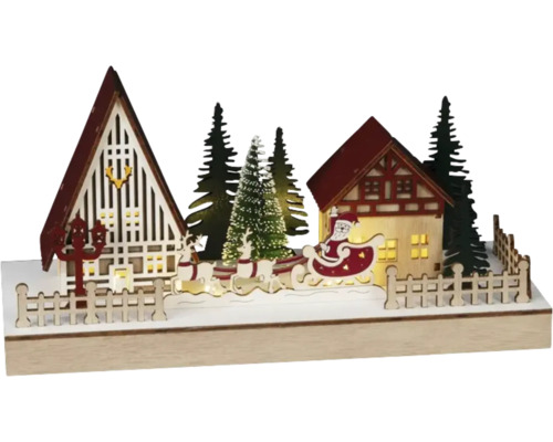 Vánoční dekorace s Santa Clausem, soby, domy a stromy