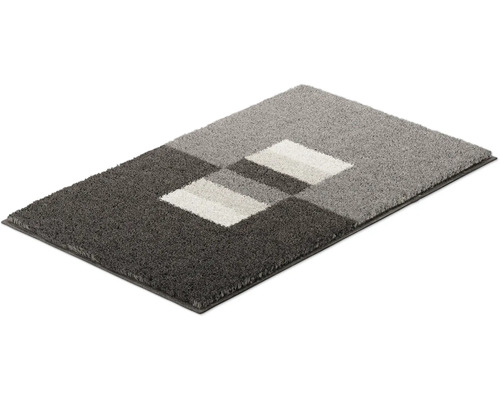 Obdélníkový koberec s geometrickým vzorem v různých odstínech šedé