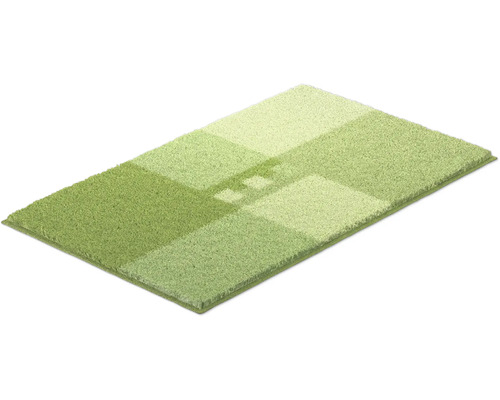 Zelený koberec s geometrickým vzorem