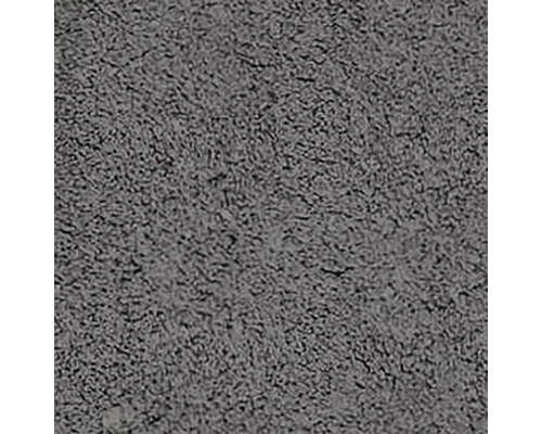 Detail šedého koberce s hustou texturou