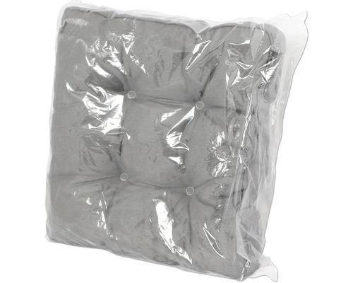 Šedý podsedák s knoflíky v průhledném obalu