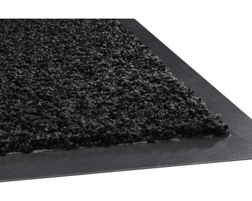 Čisticí rohožka s textilním povrchem a gumovým okrajem