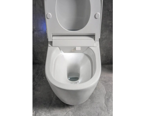 Bílá hluboká splachovací toaleta pro montáž na stěnu s otevřeným splachovacím okrajem a WC sedátkem