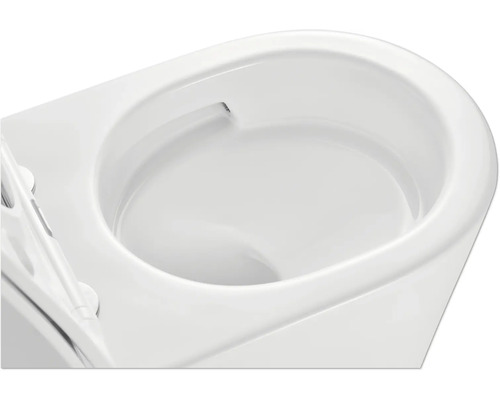 Detail bílé toalety bez oplachového kruhu