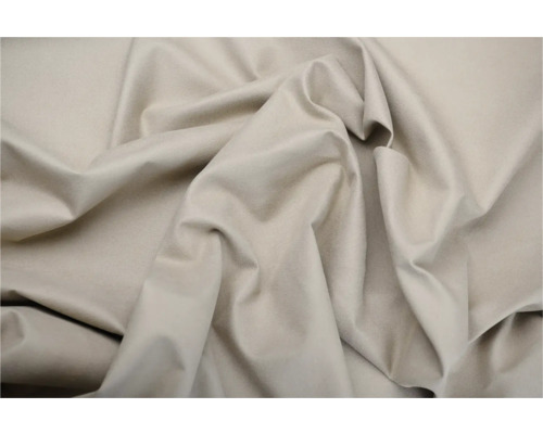 Detail béžové látky s záhyby