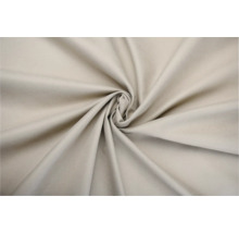 Béžová látka ve stočeném provedení