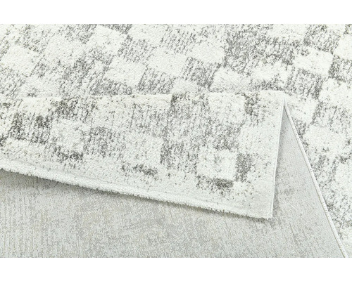 Koberec s geometrickým vzorem