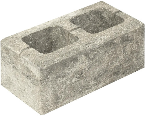 Šedý betonový blok se dvěma vybráními