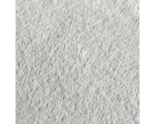 Detail šedého povrchu koberce