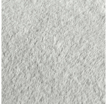Detailní záběr šedého koberce