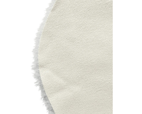 Detailní pohled na béžovou desku z kožených vláken