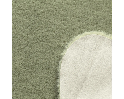 Detail kulatého koberce s vlasem