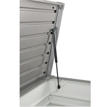 Detailní pohled na otevřený úložný box s plynovou pružinou