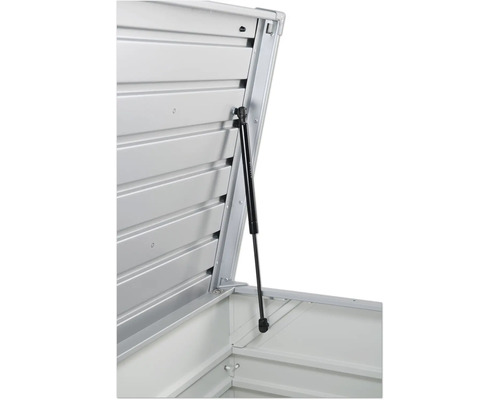 Detailní pohled na otevřený úložný box s plynovou pružinou