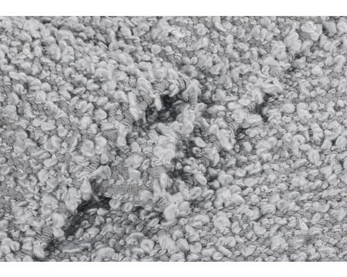 Detailní záběr koberce se smyčkovou strukturou