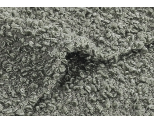 Detailní záběr koberce se smyčkovou strukturou