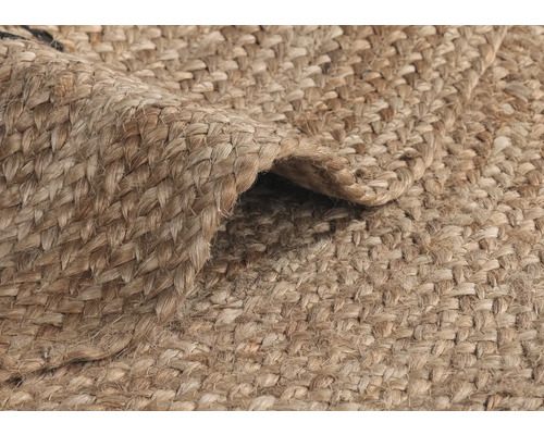 Detail tkaného koberce z přírodních vláken