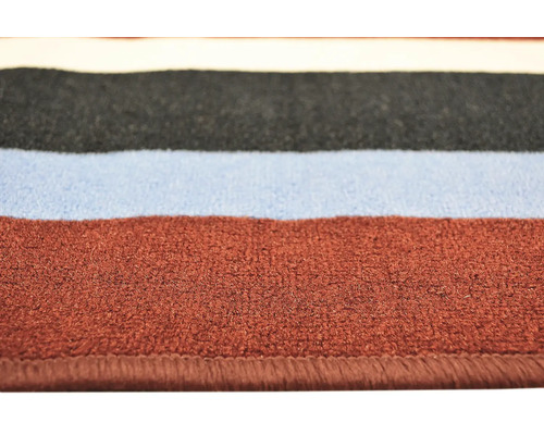 Detail pruhovaného koberce