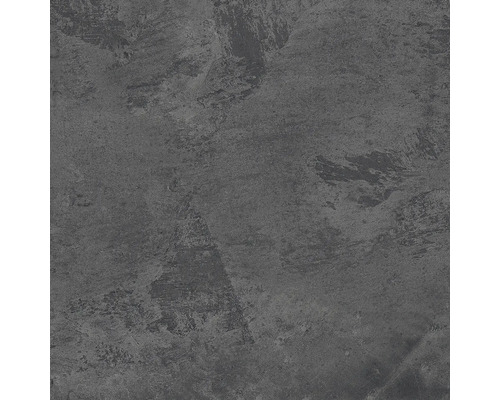 Detail šedého betonového povrchu s nepravidelnou texturou