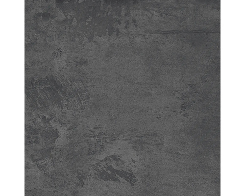 Detailní záběr tmavě šedé betonové podlahové dlaždice s matným povrchem