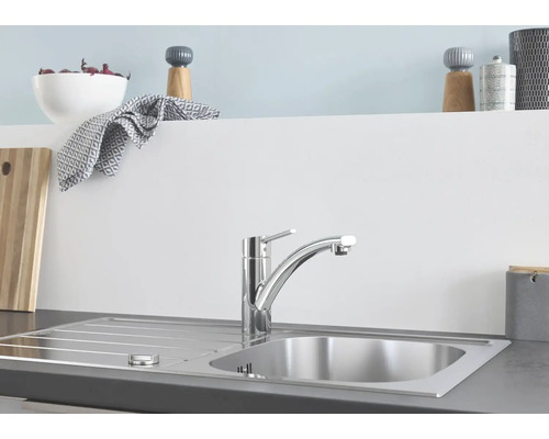 Kuchyňský dřez s baterií na pracovní desce