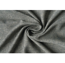 Detailní záběr na stočenou šedou potahovou látku