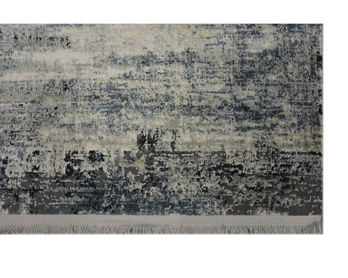 Koberec s abstraktním vzorem.