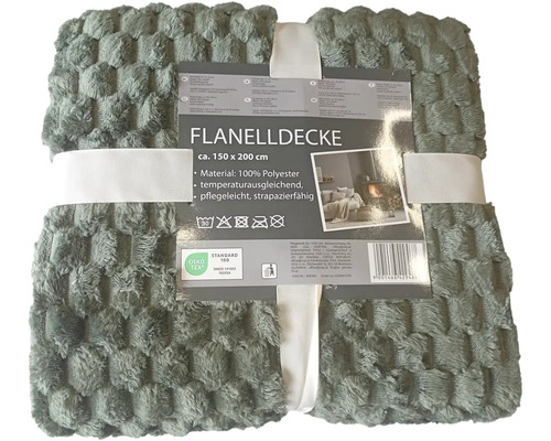 Zabalená flanelová deka, přibližně 150 krát 200 centimetrů, ze 100 procent polyesteru.