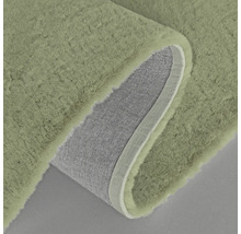 Kusový koberec, viditelná zadní strana