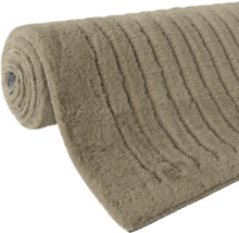 Srolovaný běhoun s žebrovaným povrchem