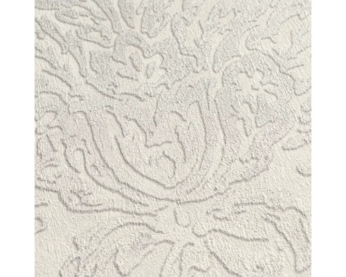 Detail strukturované tapety s květinovým vzorem