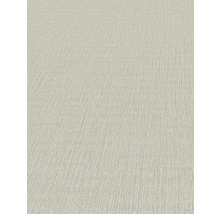 Detailní pohled na béžovou strukturovanou tapetu.