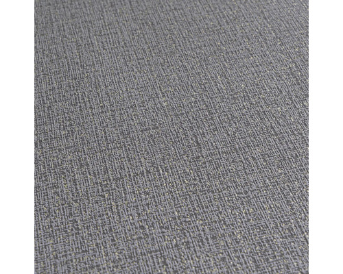 Detailní záběr šedé strukturované tapety