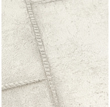 Detail strukturované tapety se vzorem švu