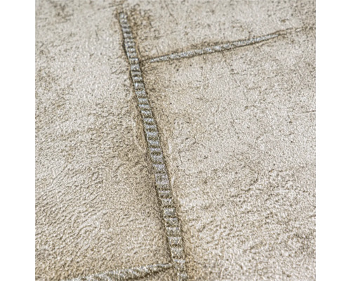 Detail strukturované tapety se vzorem švu