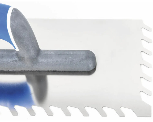 Detailní záběr zubové stěrky s rukojetí