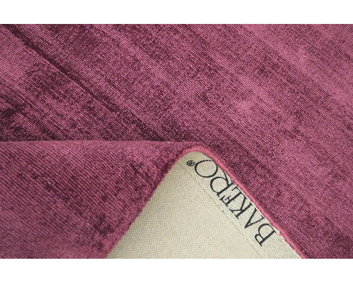 Detailní záběr koberce BAKERDO s tkanou texturou