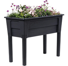 Plastový vyvýšený záhon s květinami