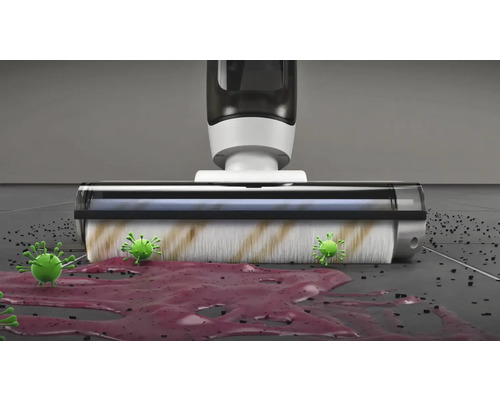 Pohled shora na podlahový mycí vysavač, který vysává tekutiny a nečistoty z podlahy, s vyobrazením bakterií.