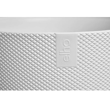 Detailní pohled na květináč s logem Elho a geometrickým vzorem