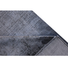 Detail vzorovaného koberce