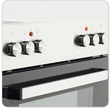 Detail sporáku s otočnými knoflíky