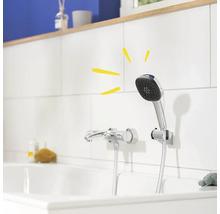 Sprchová souprava v koupelně s vanovou baterií a ruční sprchou